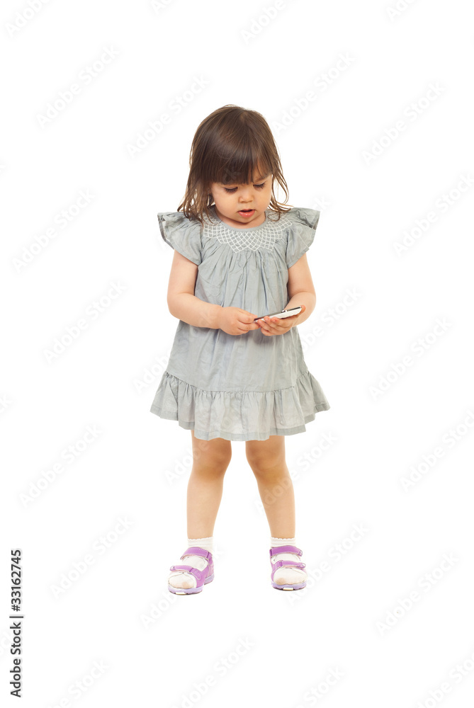 Little toddler girl holding cell phone Little toddler girl holding cell phone