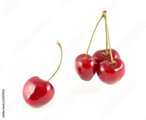 Cherries against a white background