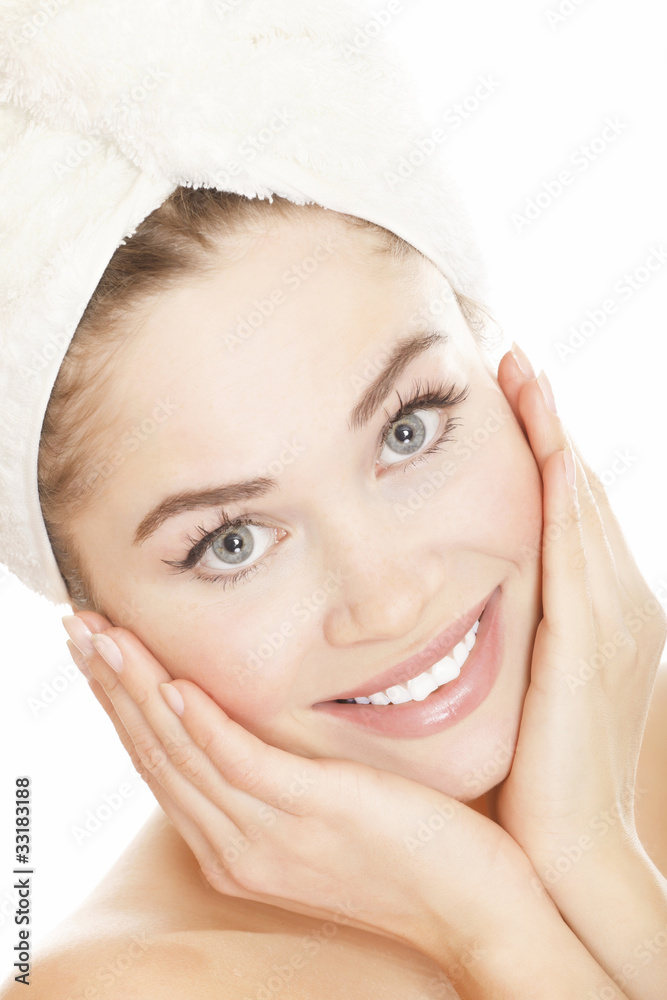 Beautiful young woman face with white towel on the head Beautiful young woman face with white towel on the head