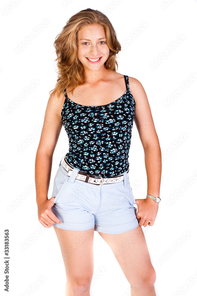 Beautiful woman in shorts, posing indoors Beautiful woman in shorts, posing indoors