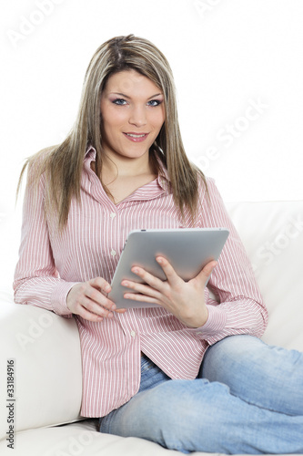 young beautiful woman on sofa at home