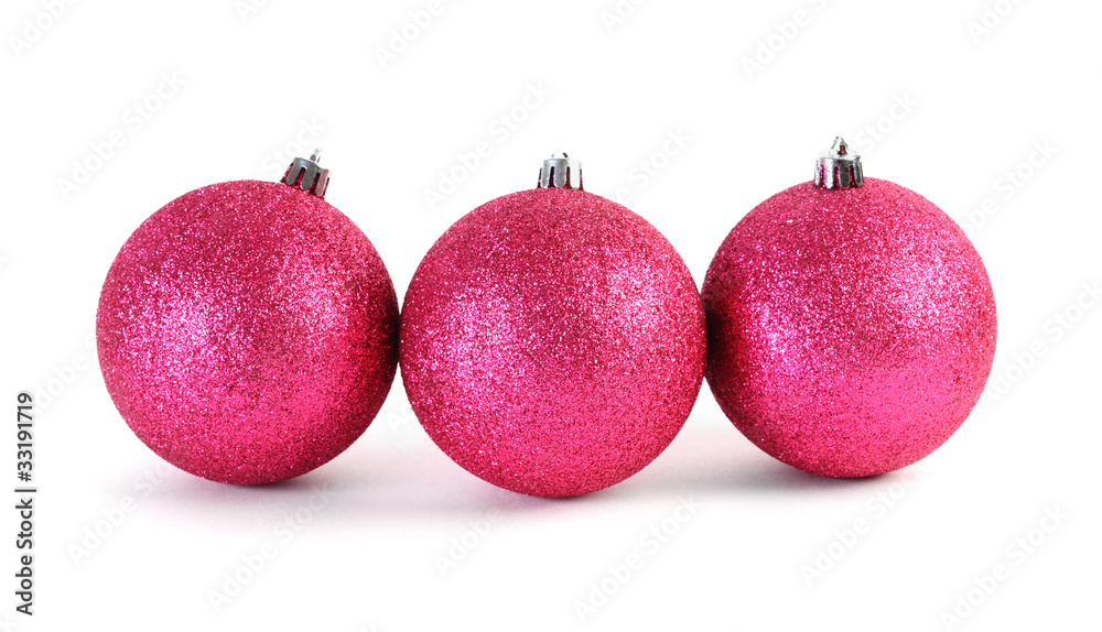 Three red Christmas tree balls lies in the range isolated Three red Christmas tree balls lies in the range isolated