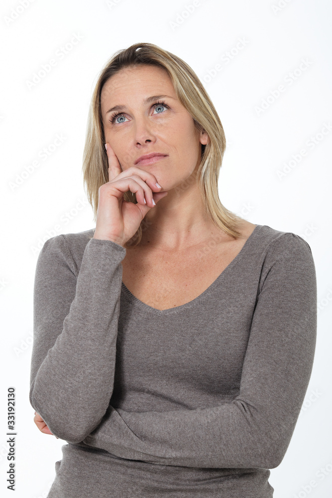 beautiful pensive woman in studio looking up beautiful pensive woman in studio looking up