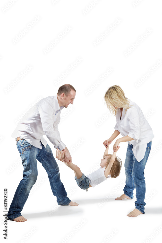 Father and mother hold their daughter for hands and feets