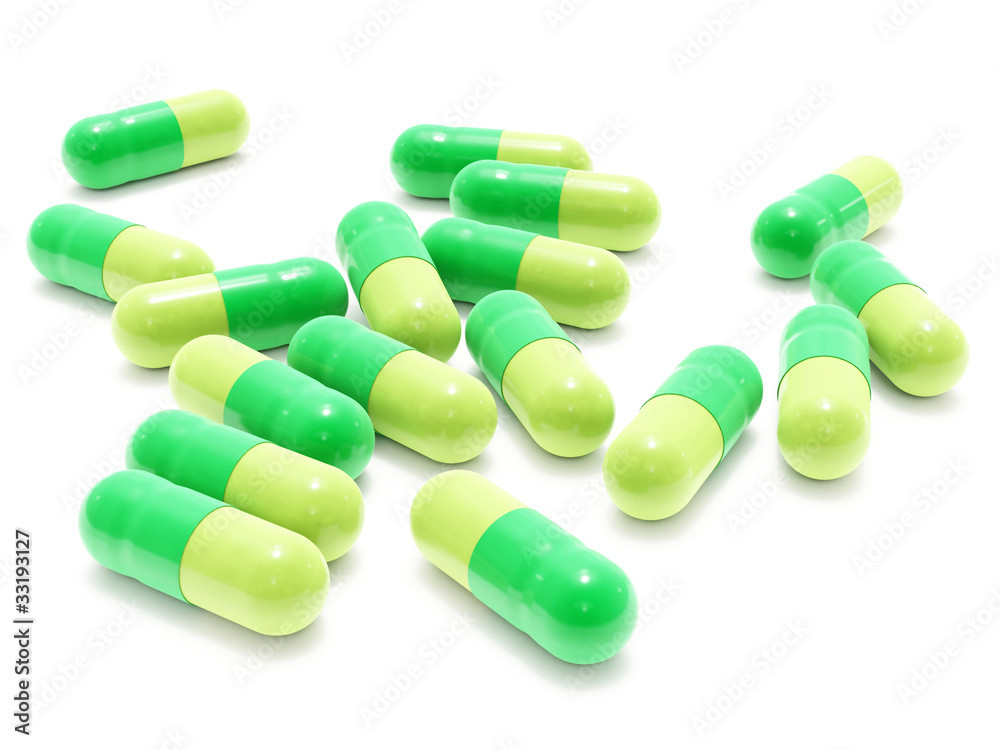 Many green pills on white background, isolated