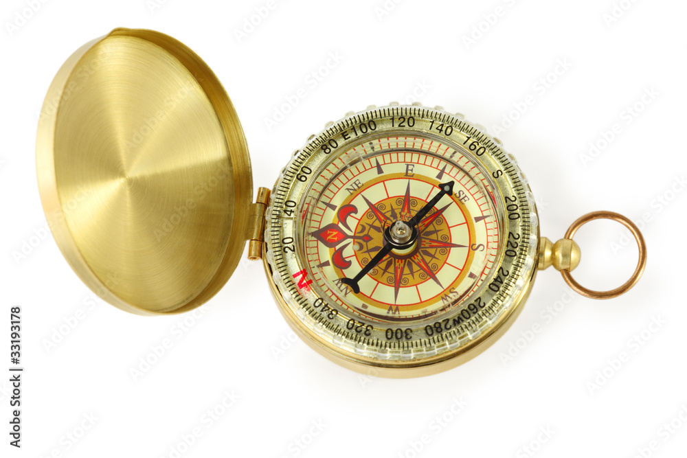 beautiful golden compass with black needle isolated beautiful golden compass with black needle isolated