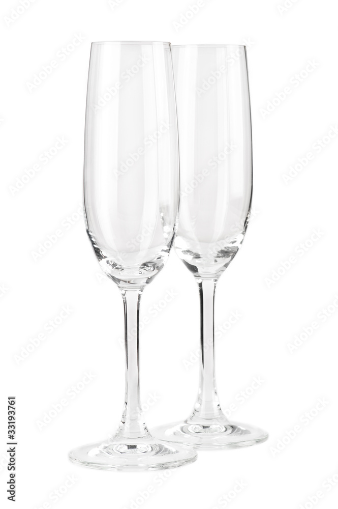 Two empty champagne glasses isolated on white