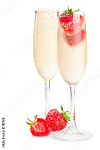 Two glasses of sparkling wine (champagne) and strawberry