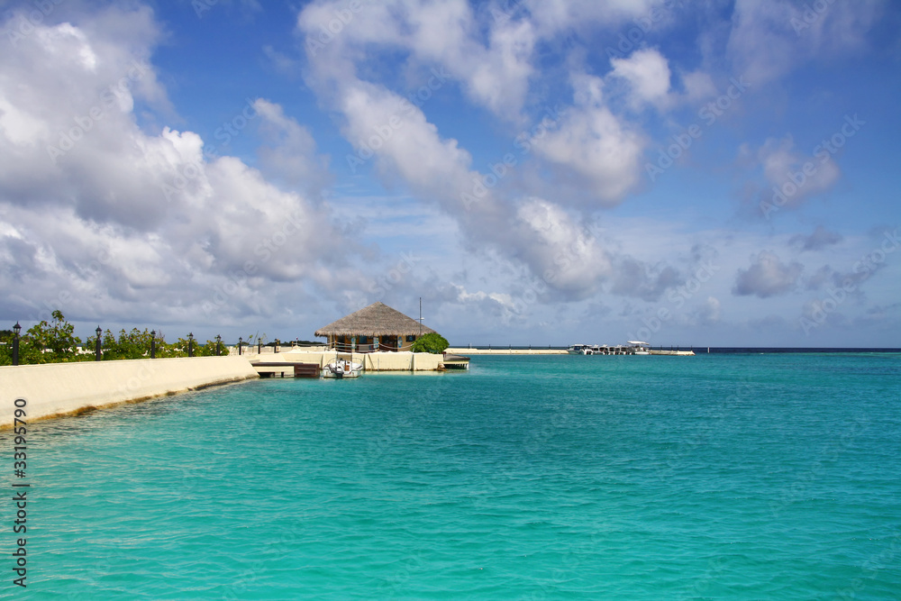 Tropical bay of Maldives with blue lagoon