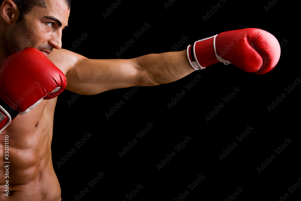Young Boxer fighter over over black background Young Boxer fighter over over black background