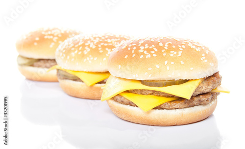 arrangement of cheeseburger and hamburger isolated on white