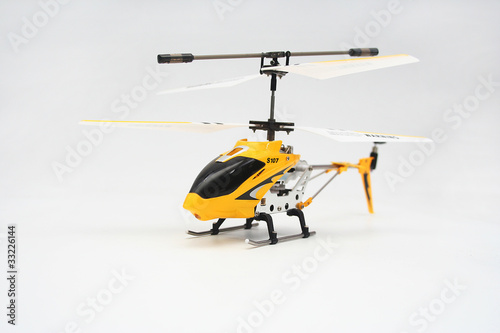 Isolated Yellow Remote Controlled Helicopter