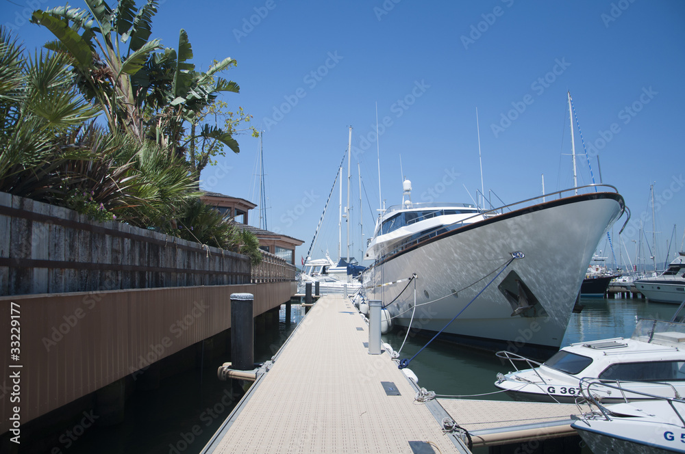 Fototapeta premium Luxury Yacht at the pontoon