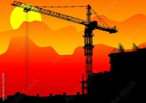 Construction cranes sun