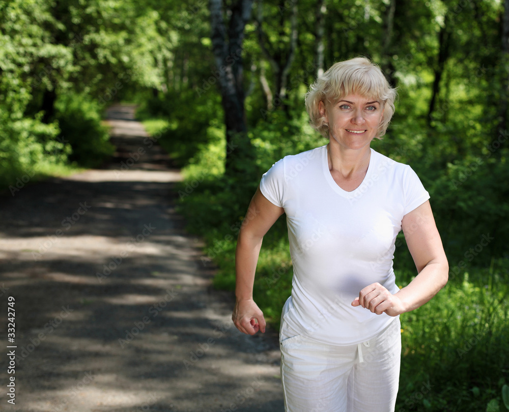 Elderly woman likes to run in the park Elderly woman likes to run in the park