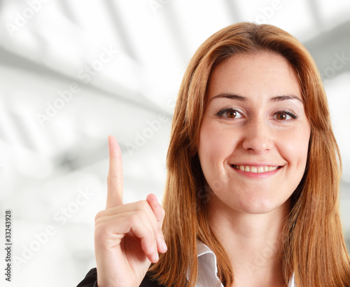 Woman pointing her finger up