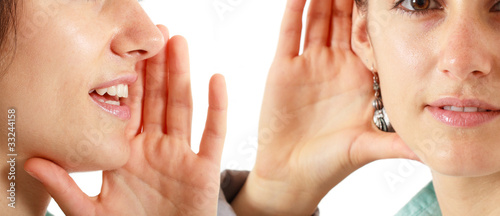 A beautiful girl whispering something