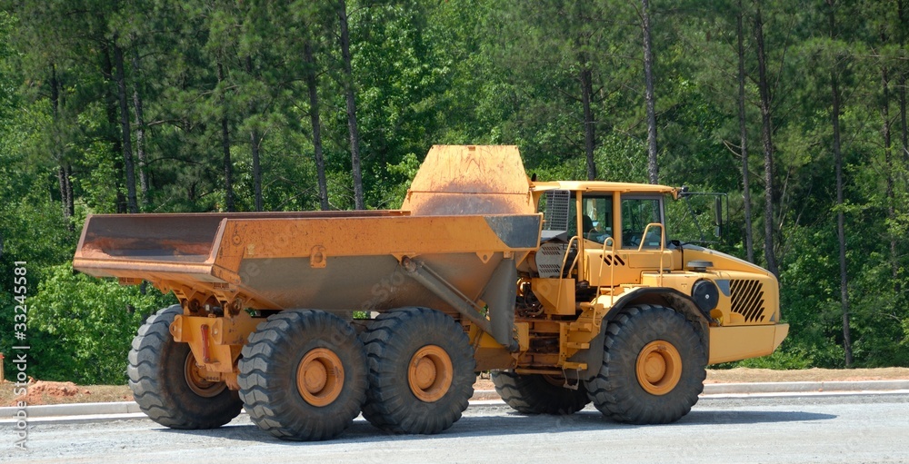 Obraz premium Heavy Equipment Dump Truck at construction site