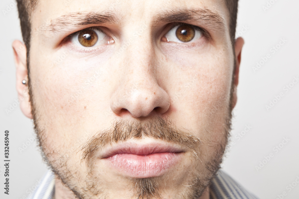 Obraz premium young man's worried expression, intense look