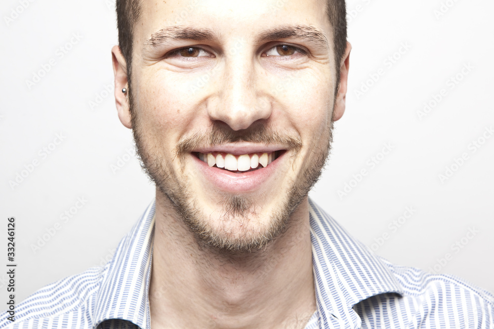 Obraz premium young man's face, smiling