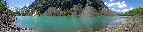 Fototapeta Naklejka Na Ścianę i Meble -  Mountain lake in background with high mountain