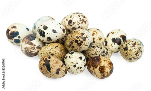 Quail eggs isolated on white the background