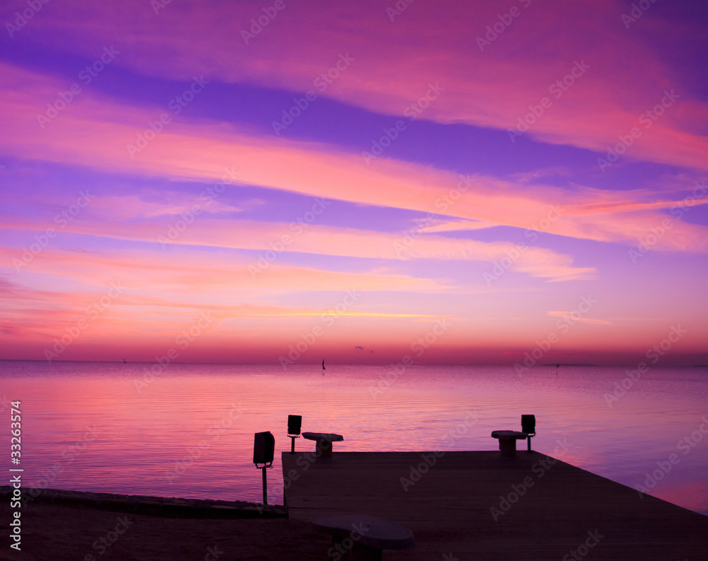 Fototapeta premium Pier over Sunset Waters