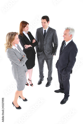 businessman and businesswoman standing chatting