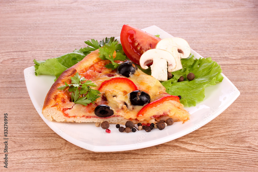 tasty pizza with olives on a wooden background tasty pizza with olives on a wooden background