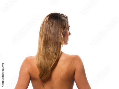 Thoughtful topless woman looking to side