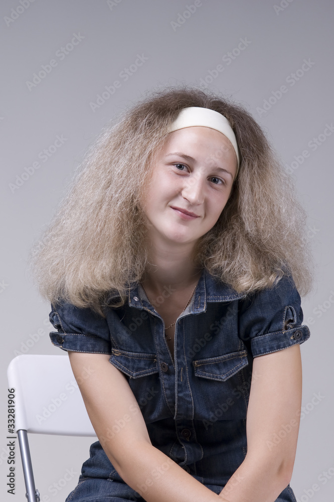Beautiful young woman in blue jeans dress Beautiful young woman in blue jeans dress