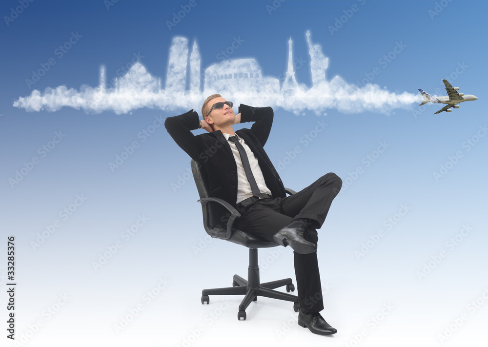 Business man dreaming about his holidays Business man dreaming about his holidays