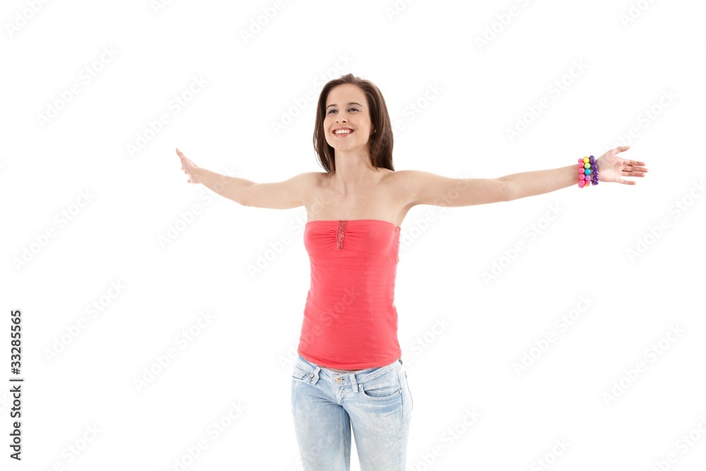 Laughing trendy girl with arms wide open