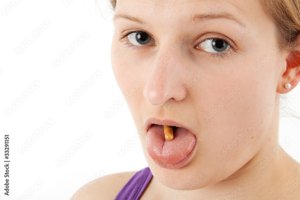 Kapsel auf der Zunge Stock Photo Adobe Stock