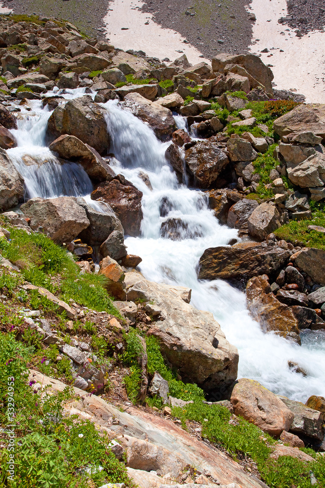 Scenic view of caucasus mountains. waterfall