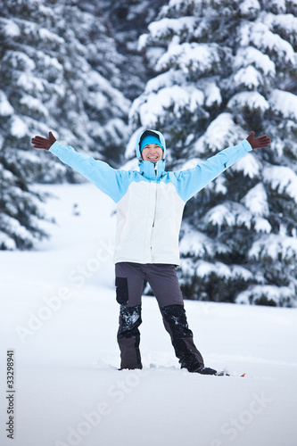 Hiker in snow forest