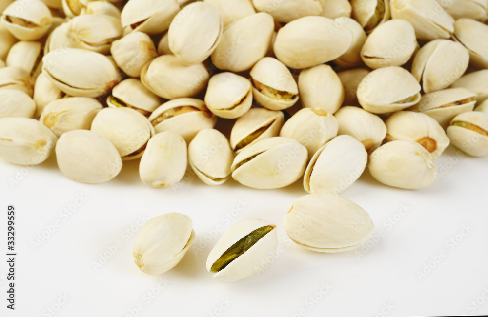 Pistachios on a white background Pistachios on a white background