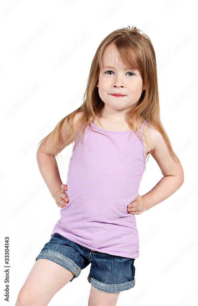 Little girl with shorts on posing for camera, isolated on white Little girl with shorts on posing for camera, isolated on white
