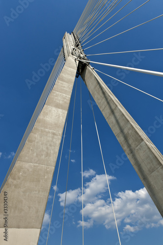 Fototapeta Naklejka Na Ścianę i Meble -  Abstract. Modern suspension bridge.