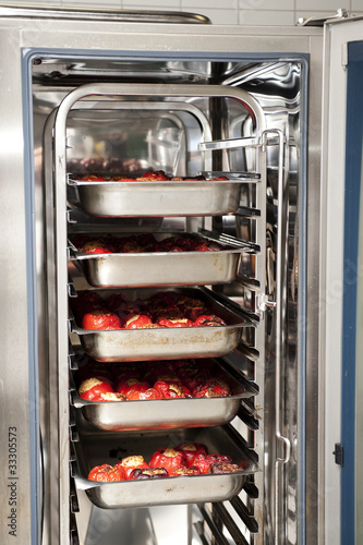 stuffed peppers in an industrial convection oven