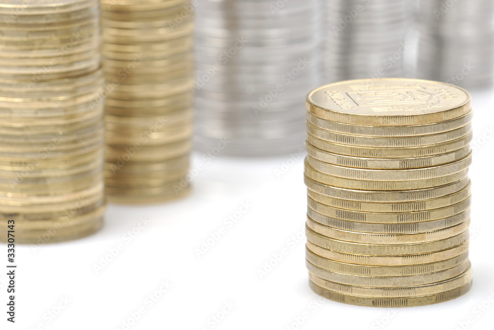 stacks of coins isolated on white stacks of coins isolated on white