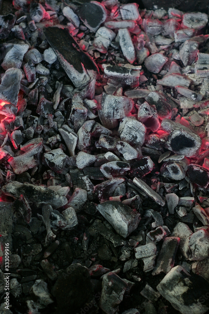 Closeup of burning charcoal with selective focus