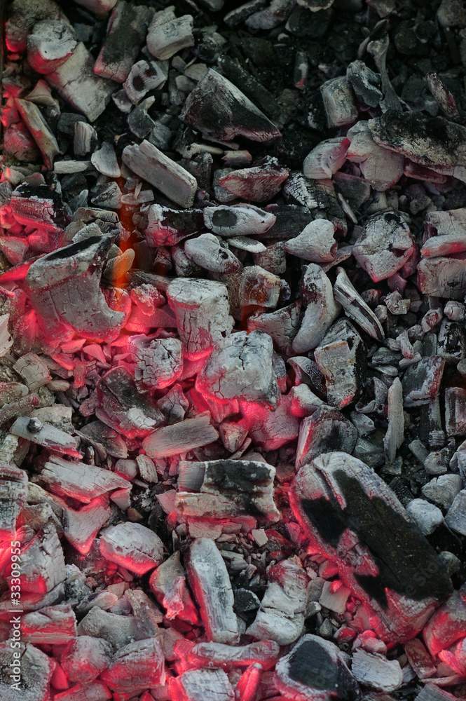 Closeup of burning charcoal with selective focus