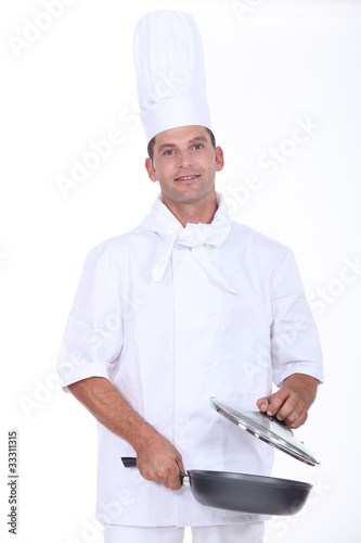 chef holding a pan