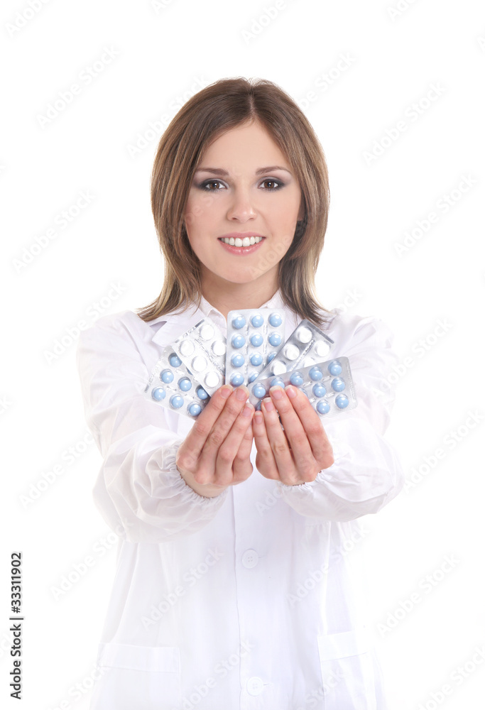 Young and attractive female doctor isolated on white Young and attractive female doctor isolated on white