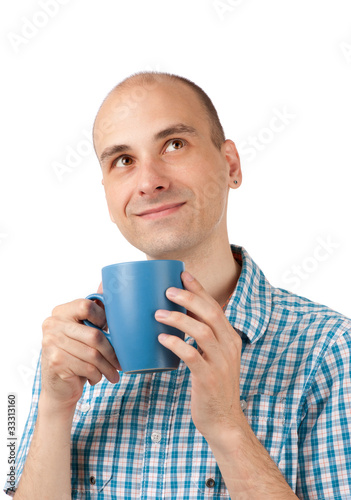 Portrait of a young man drinking coffee