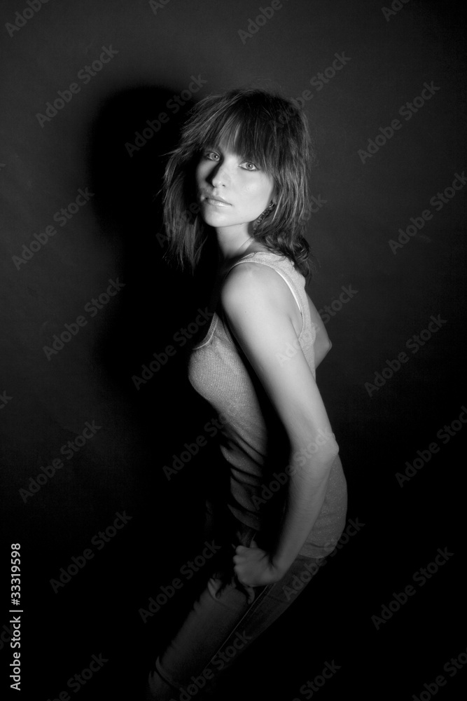 Portrait of a beautiful girl on black background Portrait of a beautiful girl on black background