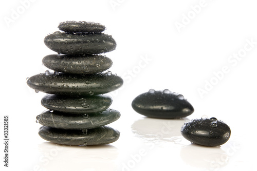Canvas Print wet zen stones isolated over a  white background.