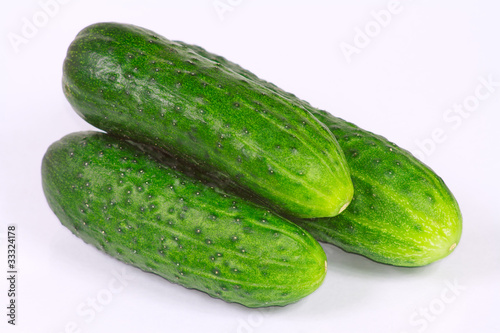 The three fresh cucumbers from kitchen garden