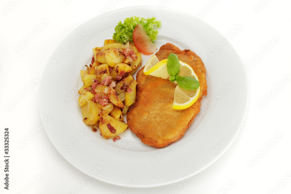 Schweineschnitzel Wiener Art mit Bratkartoffeln Schweineschnitzel Wiener Art mit Bratkartoffeln